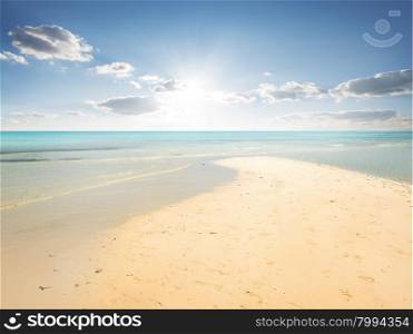 Sand beach and turquoise water in lagoon