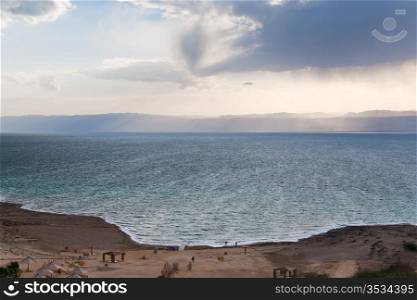 sand beach on Dead Sea coast in Jordan in evening