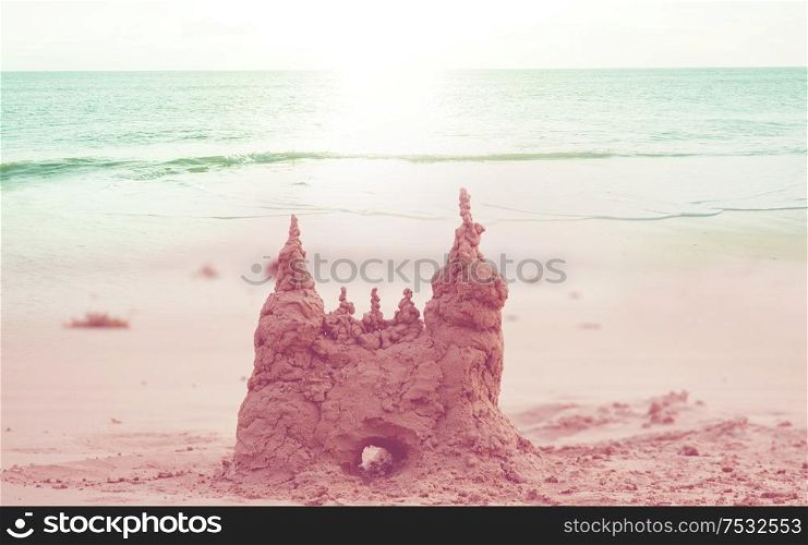 Sand castle on the sea beach