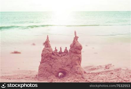 Sand castle on the sea beach