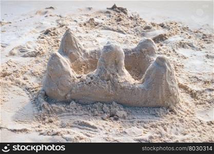 Sand castle on tropical white sandy beach. Sand castle on tropical sandy beach
