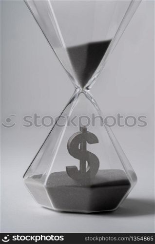 Sand clock for business concept and currency exchange