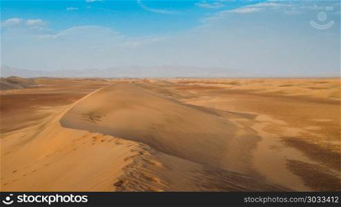 Sand dunes at Dasht-e-Lut, a large salt desert located in the provinces of Kerman, Sistan and Baluchestan, Iran. Sand dunes at Dasht-e-Lut, a large salt desert located in the provinces of Kerman, Sistan and Baluchestan, Iran.