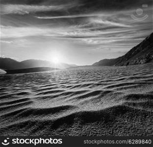 Sand dunes in Himalayas on sunrise. Hunder, Nubra valley, Ladakh, India. Black and white version