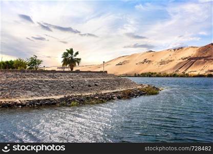 Sand dunes on river Nile at sunset in Aswan, Egypt. Sand dunes on river Nile