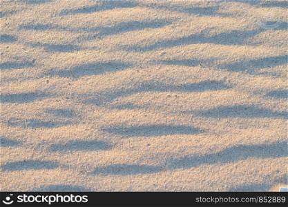 sand pattern in the desert in warm sunlight