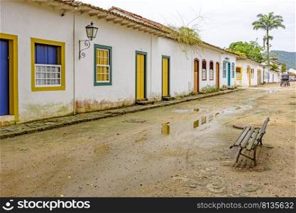 Sand street and old houses in colonial style on the streets of the old and historic city of Paraty founded in the 17th century on the coast of the state of Rio de Janeiro, Brazil. Sand streets and old houses in colonial style on the old and historic city of Paraty
