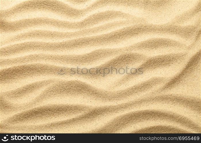 Sand texture for summer background. Copy space. Top view