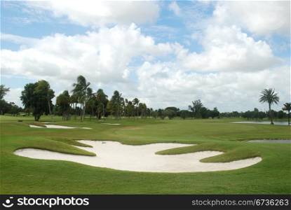 Sand trap on an overcast day, Miami, Florida