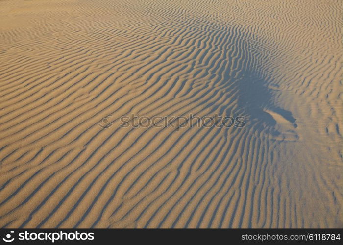 Sand waves texture in a Mediterranean beach at Spain