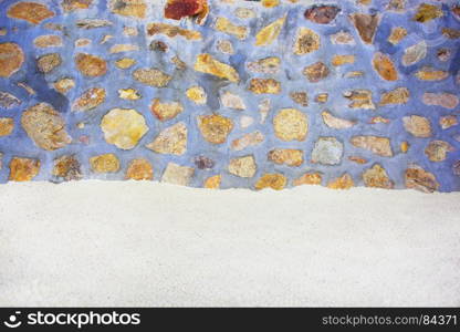 Sand with stones in cement Wall.