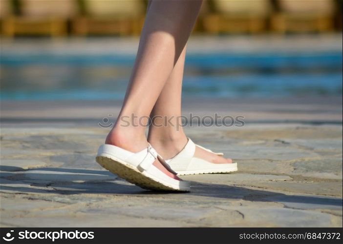 Sandals in front of a pool. Sandals in front of a pool . Sandals in front of a pool on the island of Crete