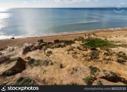 Sandstone low cliffs beach and sea, Taddiford Gap, Milford on Sea, Hampshire, England United Kingdom.