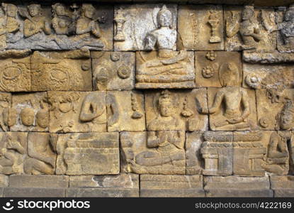 Sandstone wall of Borobudur, Java, Indonesia