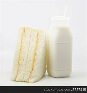 sandwich and milk on isolated background