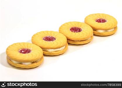 Sandwich biscuits with cream on white background