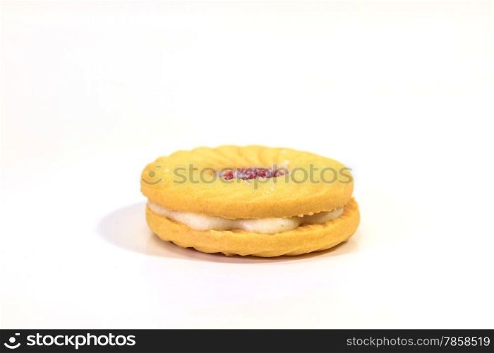 Sandwich biscuits with cream on white background