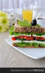 Sandwich bread with cereals, cheese, tomato and cucumber