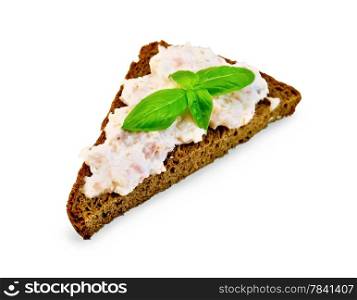 Sandwich on one piece of rye bread with cream of salmon and mayonnaise, basil isolated on white background