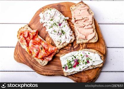 sandwich topped with different types of bread spread, top view