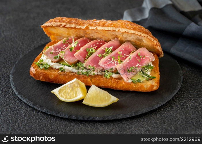 Sandwich with cream cheese, tuna and sesame seeds