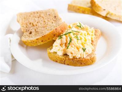 sandwich with egg salad on a plate