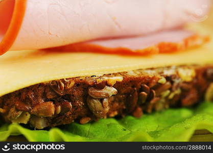 Sandwich with ham and cheese. close up