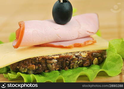 Sandwich with ham and cheese. close up