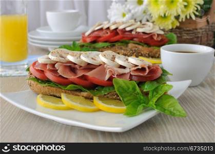 Sandwich with ham and mushrooms close up