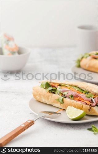 sandwich with ham fork