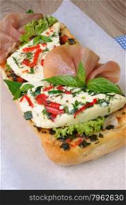 Sandwich with mozzarella and jamon on ciabatta