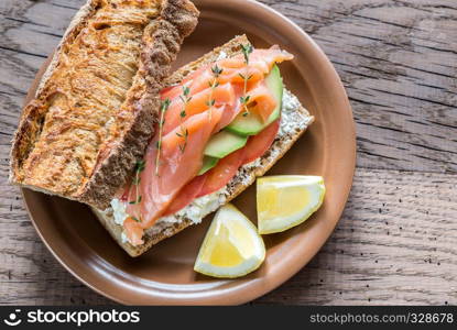 Sandwich with salmon and cheese