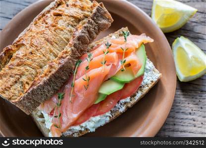 Sandwich with salmon and cheese