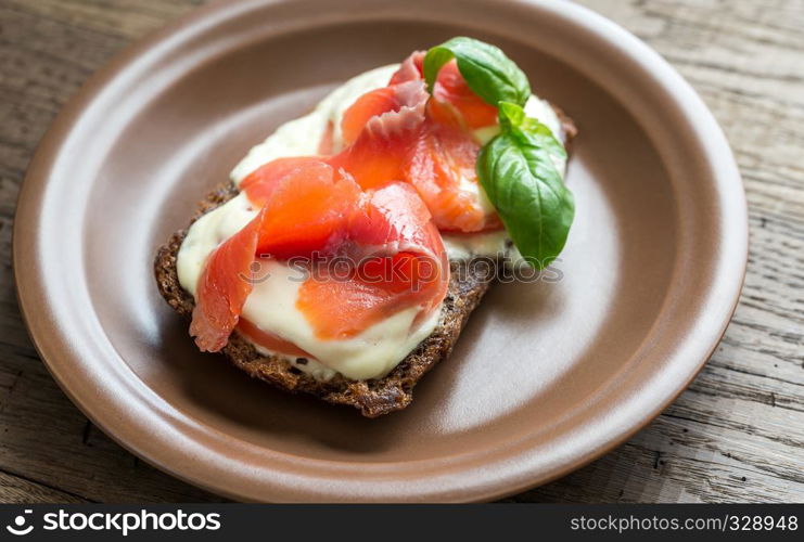 Sandwich with trout, mozzarella and tomatoes