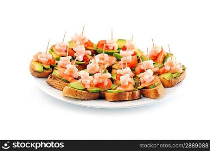 sandwiches garnish with shrimps, avokado and lettuce on plate, snack