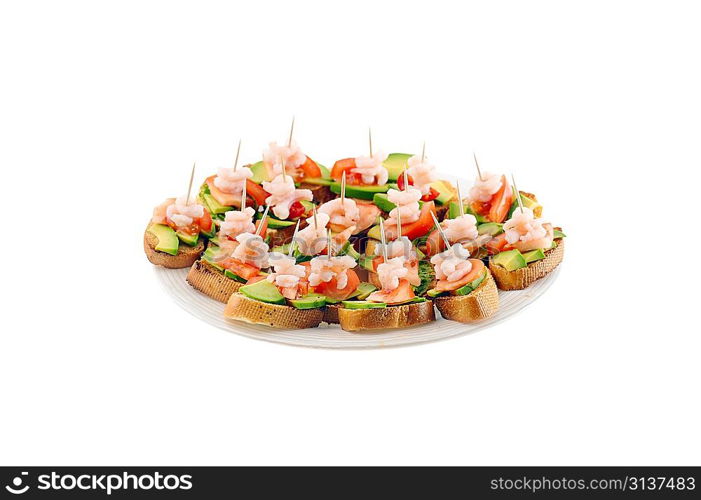 sandwiches garnish with shrimps, avokado and lettuce on plate, snack