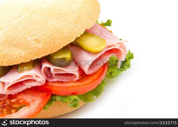 sandwiches with ham and vegetables on white background