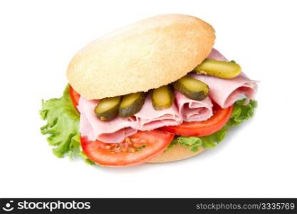 sandwiches with ham and vegetables on white background