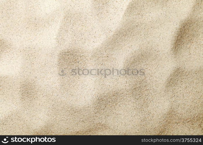 Sandy background. Summer beach texture. Top view. Copy space