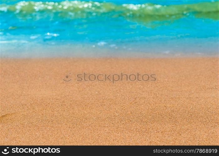 sandy beach and waves shot closeup