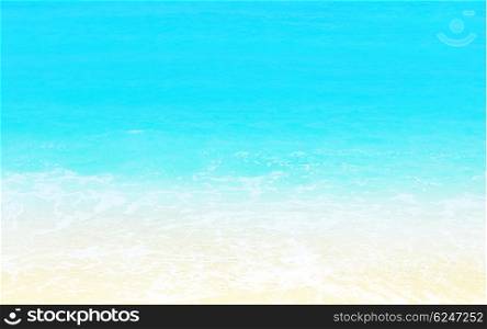 Sandy beach background with turquoise water, abstract natural blue white backdrop, calm clean tropical sea, travel and summer holidays concept