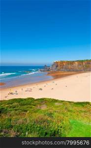 Sandy Beach on the Rocky Coast of Atlantic Ocean in Portugal