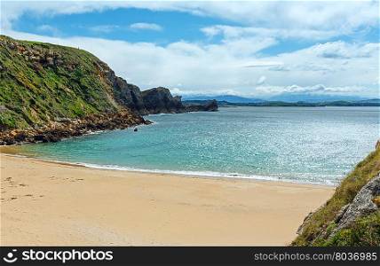 Sandy beach (Spain) Atlantic Ocean coastline landscape.