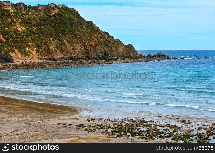 Sandy Cadavedo beach. Summer Atlantic ocean coast, Asturias, Spain.