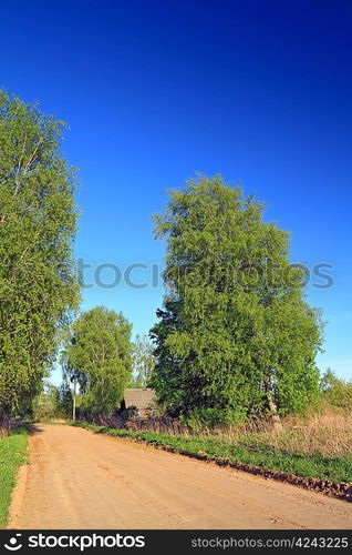 sandy road in abandoned village