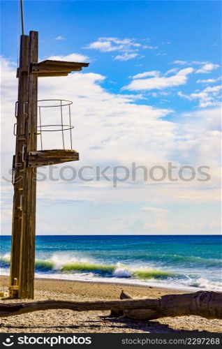 Sandy seashore with lifeguard tower. Motril beach. Costa tropical, Granada. Andalucia Spain.. Lifeguard tower on beach. Summer holidays.