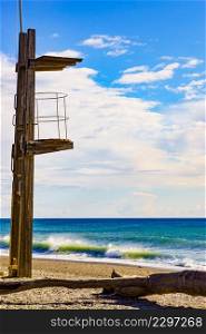 Sandy seashore with lifeguard tower. Motril beach. Costa tropical, Granada. Andalucia Spain.. Lifeguard tower on beach. Summer holidays.