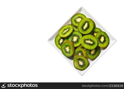 Sankt Hans 2011. Kiwi fruit on a white plate and background.