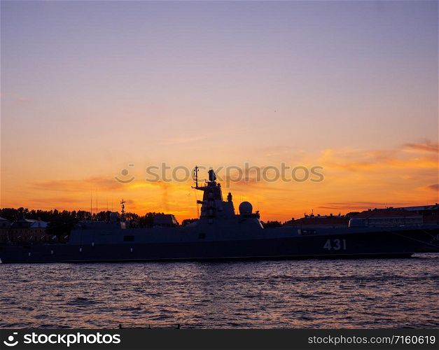Sankt Petersburg, Russia - July 27, 2019: Warship in the wake of the Neva River. Navy Day Training. Sankt Petersburg, Russia - July 27, 2019: Warship in the wake of the Neva River.