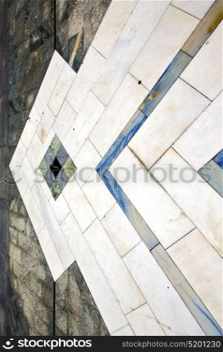 sanpietrini busto arsizio street lombardy italy varese abstract pavement of a curch and marble